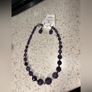 Never worn purple crystal necklace with earrings